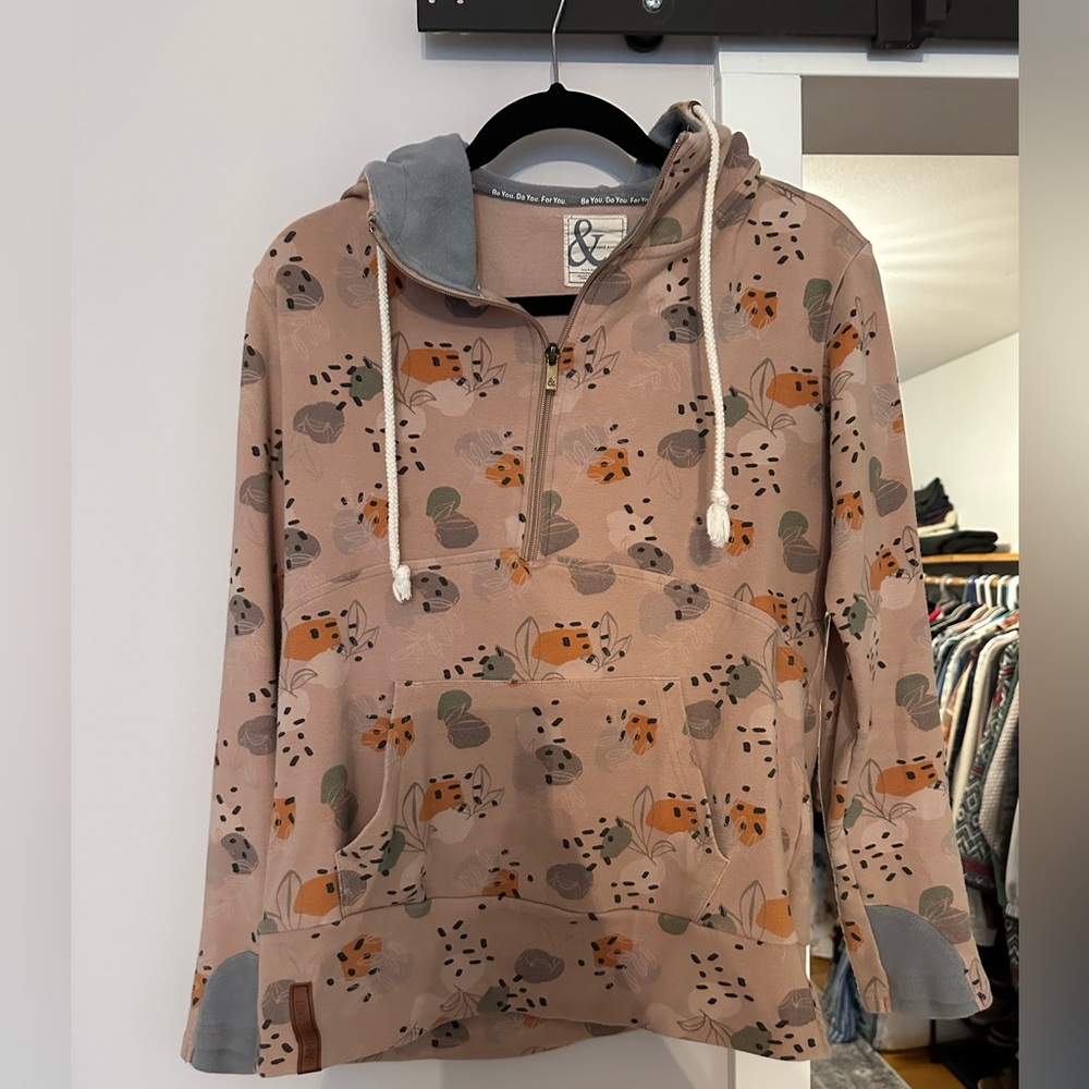 Half zip light weight pull over soft stretch like material